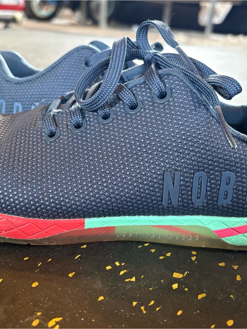 NOBULL Navy Trainer with Red and Teal Midsole Accents